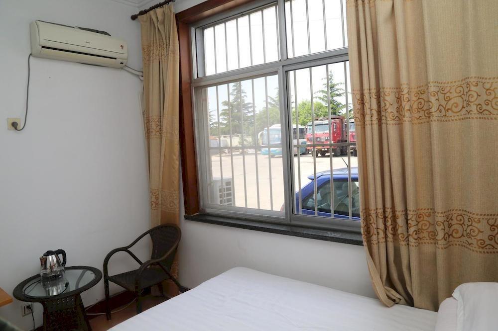 City Holiday Hotel Chengyang Exterior foto